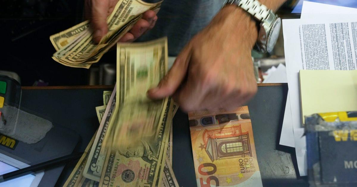 Euro falls below parity with the dollar. What's the impact?